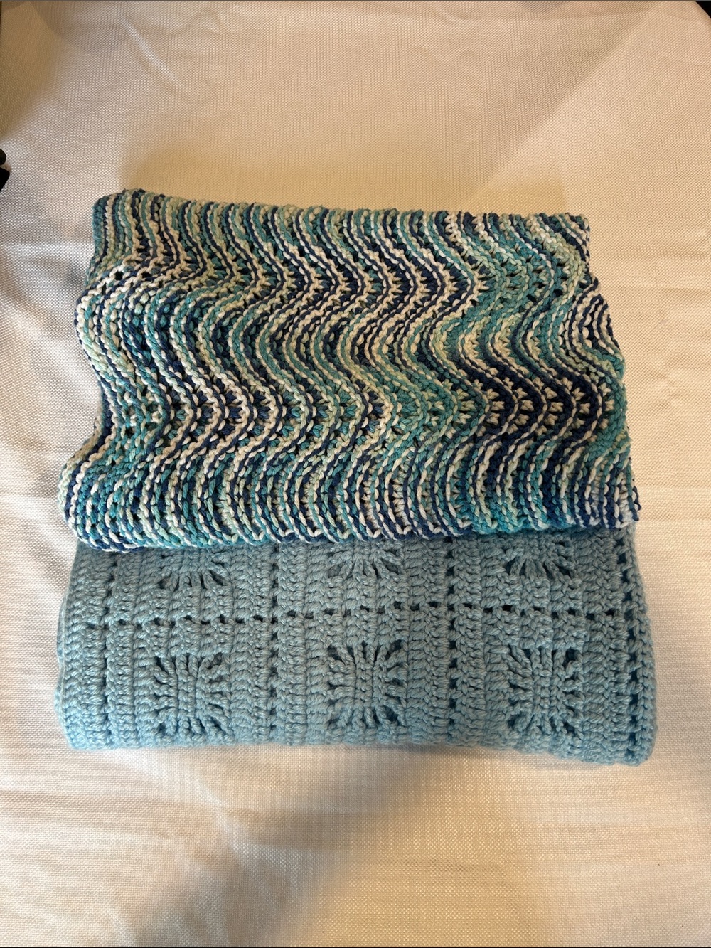 Two hand made crocheted baby blankets